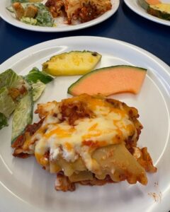 Lasagna with salad and fruit